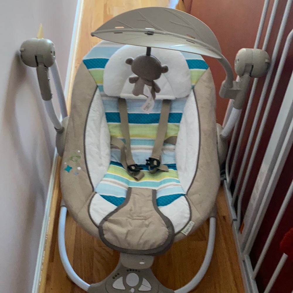 A baby new used baby swing.